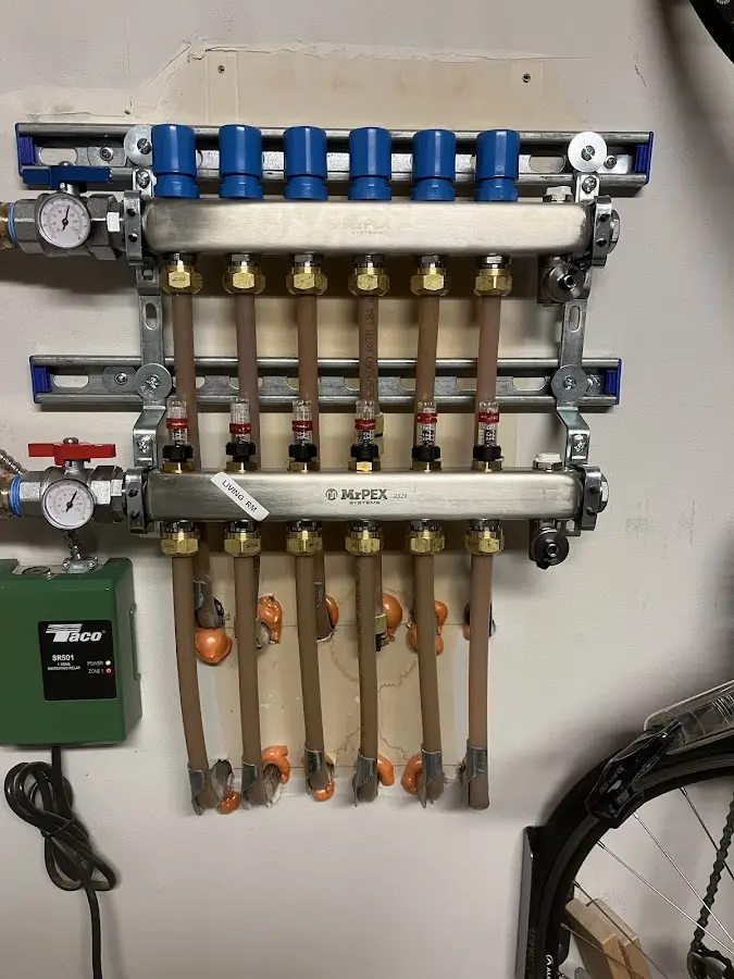 Plumber performing Water Heater Repair at a residential property in Downey